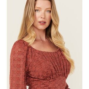 Beyond the Radar women’s floral lace long sleeve tie back cropped shirt